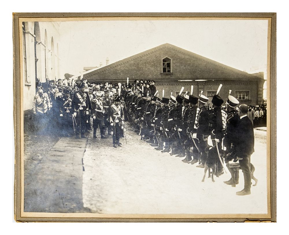 NICHOLAS II (1868-1918) Photo «Nikolas II on the regimental holiday passes a group with dogs».