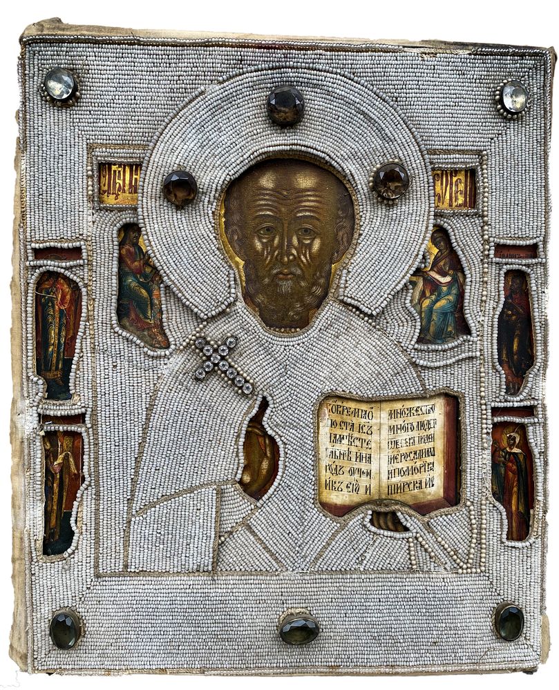 AN ICON «SAINT NICOLAS» WITH SAINTS Ekaterinburg, mid 19 th century Wood, gesso, gold leaf,