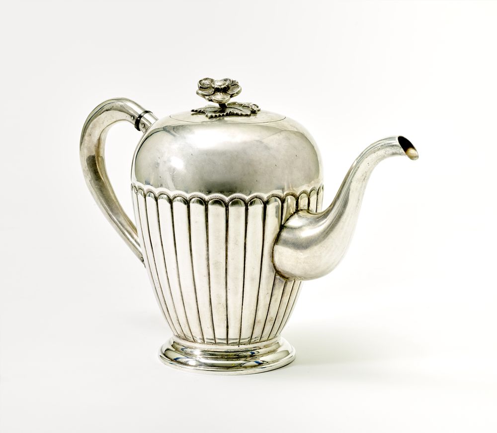 SILVER COFFEE POT WITH A LID WITH A FLORAL FINIAL Unidentified master, Russia, Moscow, 1888