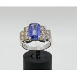SAPPHIRE AND DIAMOND RING Blue sapphire weighing about 4ct, diamonds weighing about 1ct and 18k