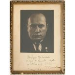 BENITO MUSSOLINI (1883-1945) Photographic portrait signed with autograph dedication dated 3 May