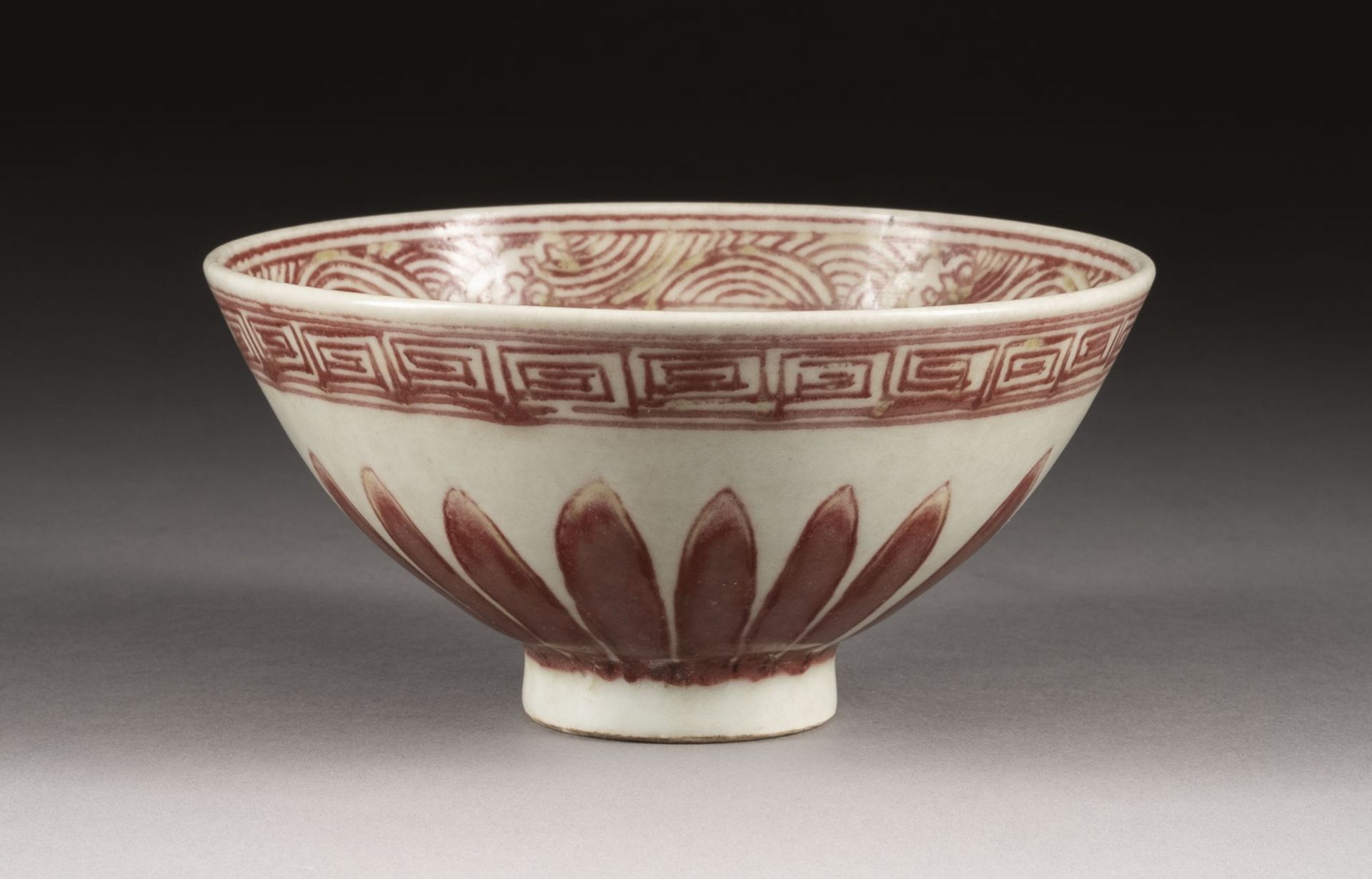 A COPPER-RED DECORATED BOWL