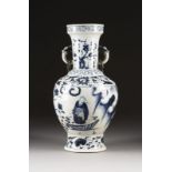 A BLUE-AND-WHITE HANDLED VASE