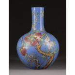 A BLUE-GLAZED FAMILLE ROSE VASE