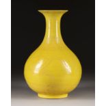 A YELLOW-GLAZED PEAR-SHAPED CARVED 'DRAGON' VASE