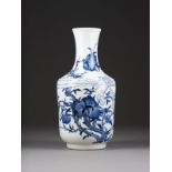 A BLUE-AND-WHITE 'NINE PEACHES' VASE