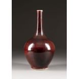 A RED-GLAZED VASE