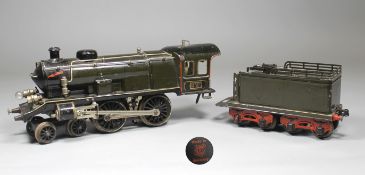 1 goße Lokomotive mit Tender, Spur HO "Märklin, EE 65/13021, 20 Volts C", farbig lithographiertes