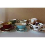 A Collection Of Aynsley Of Tea Cups