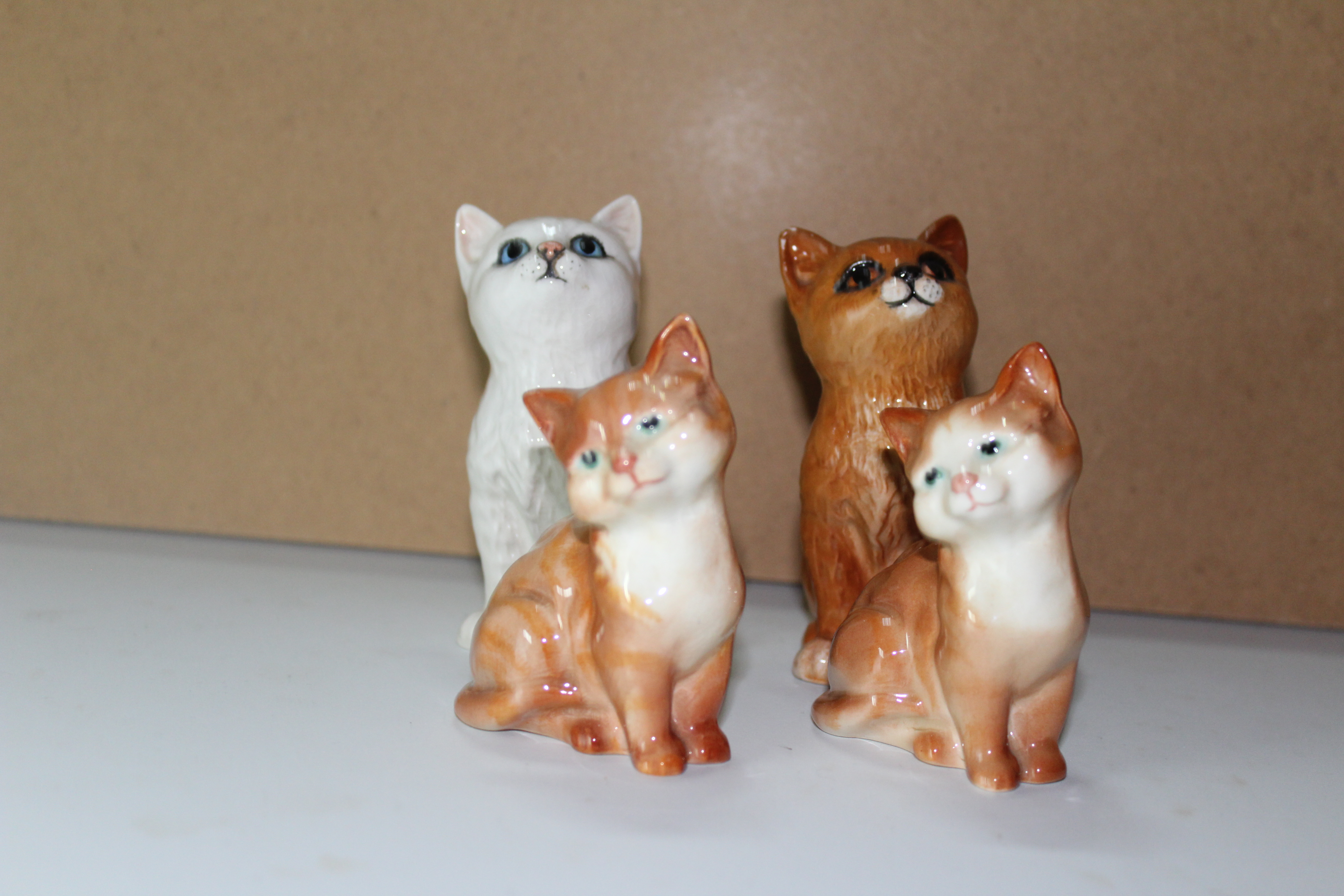 Four Beswick Cat