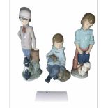 A Collection Of Three Nao By Lladro Boys Figurine