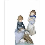 A Collection Of Three Nao By Lladro Figurine