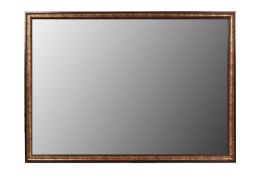 A LARGE RECTANGULAR WALL MIRROR