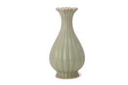 A FLUTED CELADON GLAZED PEAR SHAPED PORCELAIN VASE