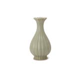 A FLUTED CELADON GLAZED PEAR SHAPED PORCELAIN VASE