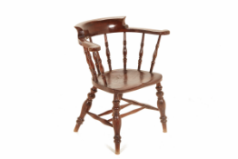 AN ANTIQUE ELM 'SMOKER'S BOW' ARMCHAIR