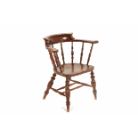 AN ANTIQUE ELM 'SMOKER'S BOW' ARMCHAIR