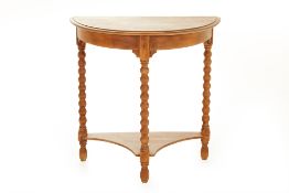 A DEMI LUNE CONSOLE TABLE