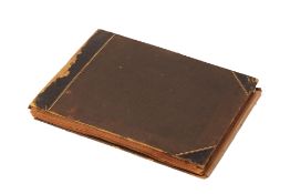 AN ANTIQUE PHOTOGRAPH ALBUM