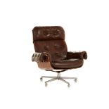 AN EAMES STYLE LEATHER LOUNGE CHAIR