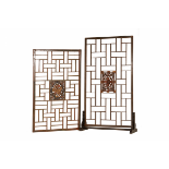A PAIR OF ANTIQUE CARVED BED PANELS