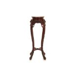 A CHINESE HARDWOOD JARDINIERE STAND