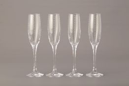 A SET OF FOUR FABERGE CHAMPAGNE FLUTES