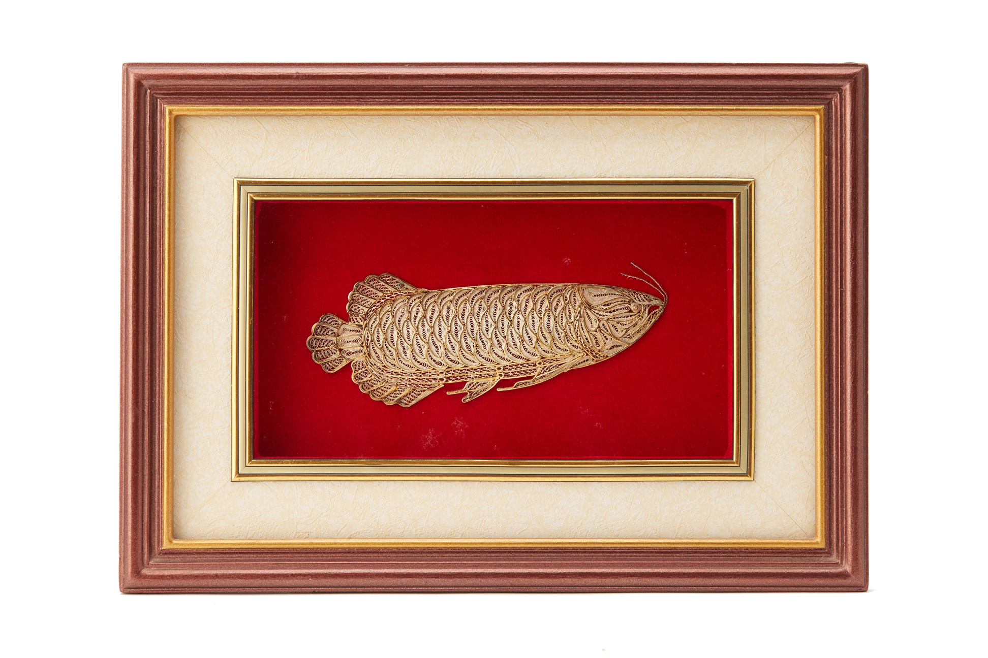 A FRAMED FILIGREE MODEL OF A CARP