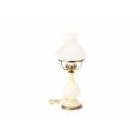 AN OIL LAMP STYLE TABLE LAMP