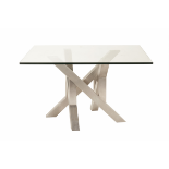 A SQUARE STAINLESS STEEL DINING TABLE WITH GLASS TOP