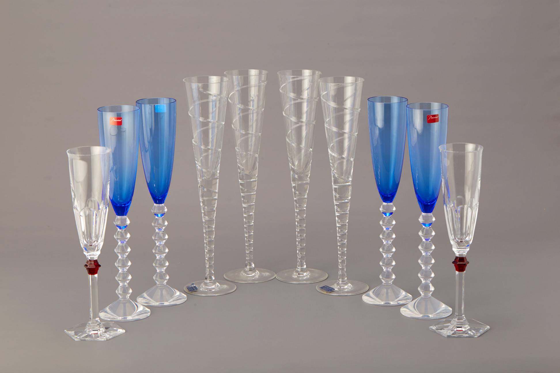 A GROUP OF TEN BACCARAT & GODINGER CHAMPAGNE FLUTES