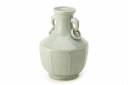 A CELADON GLAZED HU SHAPE TWIN HANDLED VASE