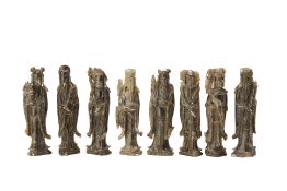 A SET OF EIGHT CHINESE CARVED STONE IMMORTALS