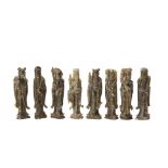 A SET OF EIGHT CHINESE CARVED STONE IMMORTALS