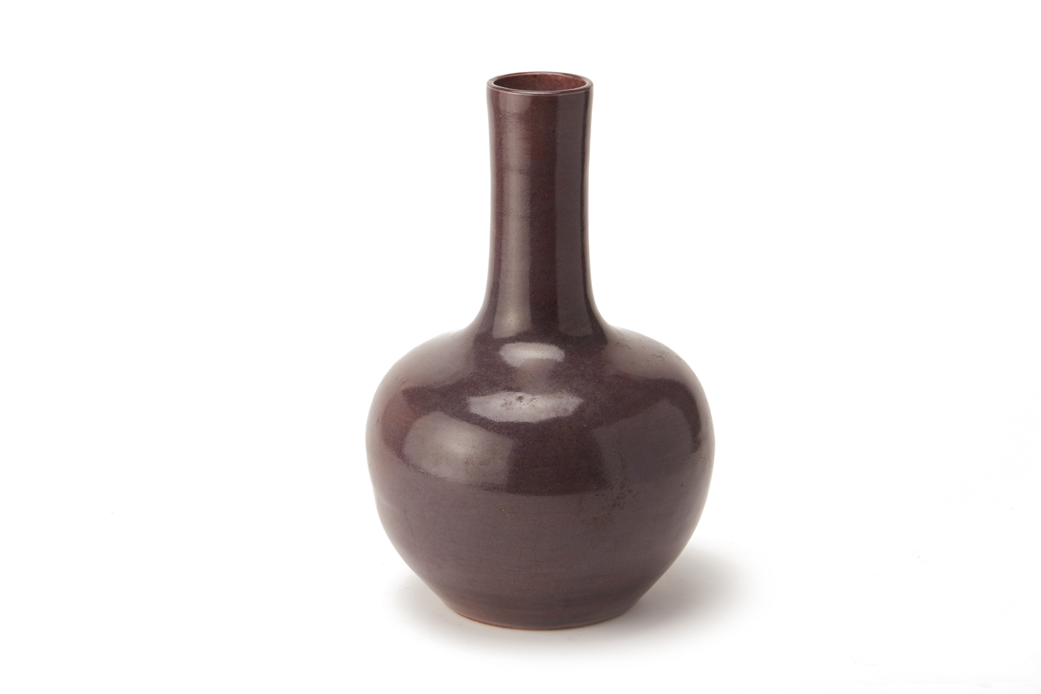 A MONOCHROME PURPLE GLAZED BOTTLE VASE