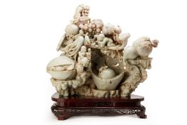 A LARGE JADE CARVING OF BOYS AND AUSPICIOUS ITEMS