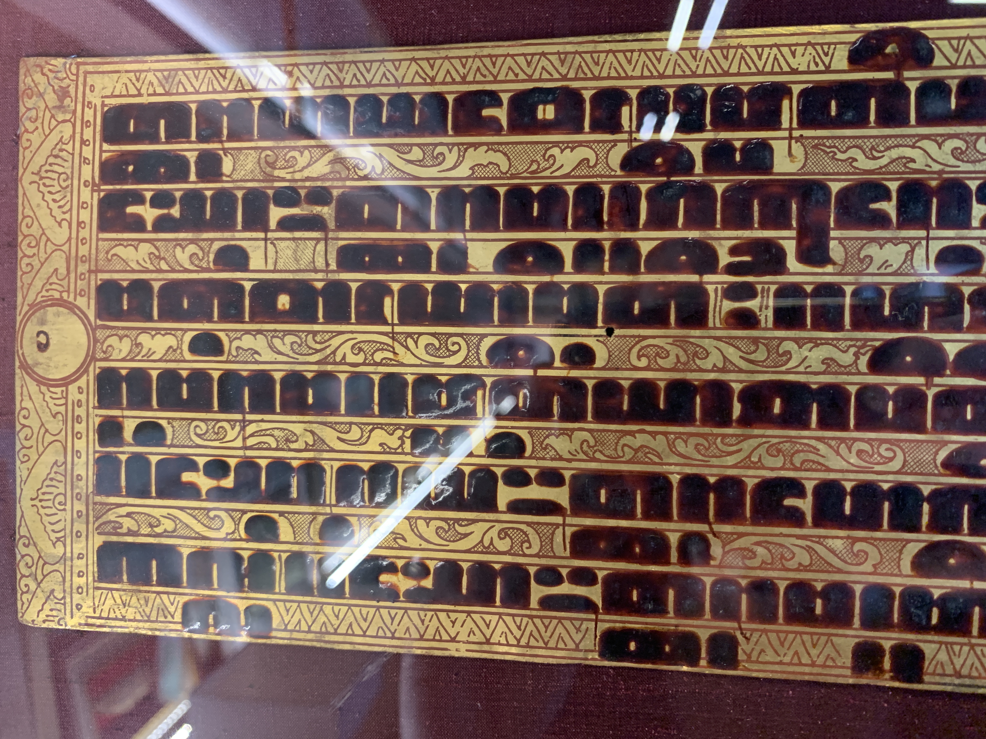 A SET OF ANTIQUE GILT BURMESE SCRIPTURE PANELS IN TWO FRAMES - Image 7 of 9