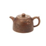 AN INSCRIBED YIXING TEAPOT AND COVER