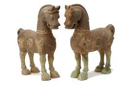 A PAIR OF ARCHAIC STYLE BRONZE HORSES