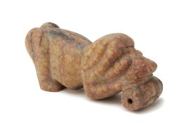 A JADE CARVING OF A STYLISED CROUCHING ANIMAL