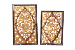 TWO CARVED GILT WOOD PANELS