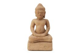 A SOUTHEAST ASIAN CARVED SANDSTONE FIGURE OF BUDDHA