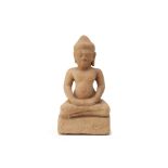 A SOUTHEAST ASIAN CARVED SANDSTONE FIGURE OF BUDDHA