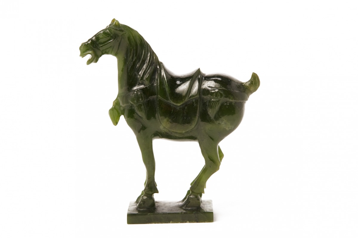 A CARVED JADE MODEL OF A HORSE