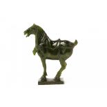 A CARVED JADE MODEL OF A HORSE