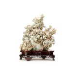 A LARGE JADE CARVING OF BIRDS, FLOWERS AND AUSPICIOUS ITEMS