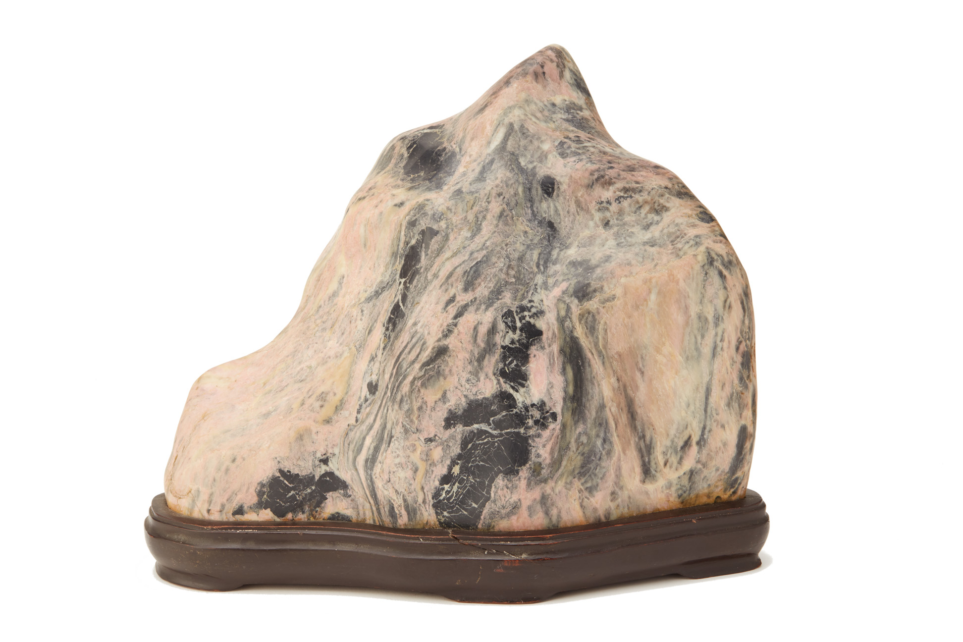 A PINK AND BLACK VEINED STONE SCHOLAR'S ROCK