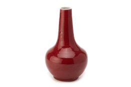 A SANG DE BOEUF PORCELAIN BOTTLE VASE