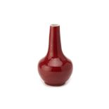 A SANG DE BOEUF PORCELAIN BOTTLE VASE