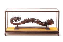 A CARVED WOOD RUYI SCEPTRE